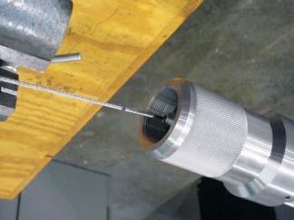 Continue pulling on the bolt ( about 2 inches ) as shown in B5 until the unit clicks into