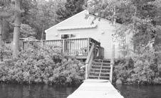 1,700SF yearroud cottage has 2Bd/1Ba w/astoishig views of lake & moutais. New septic system. New alumium dock o level lot.