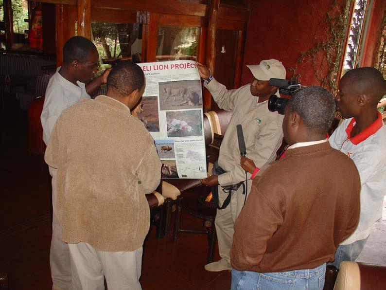 Dr Charles Musyoki showing the poster to Serena lodge manager Herman Mwasaghua In the afternoon the team leaves at 16.00 hours again for the Sinet delta.