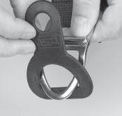 Pass the friction buckle through the tether s large opening.