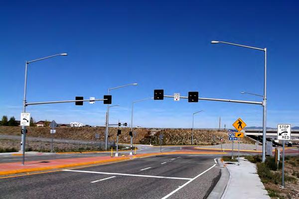 CROSSING TREATMENTS Roundabout Intersections Multi-Lane HAWK or RRFB at pedestrian crossing of two lanes FHWA accepting RRFBs, HAWK has red indication rather than flashing yellow PROWAG says At