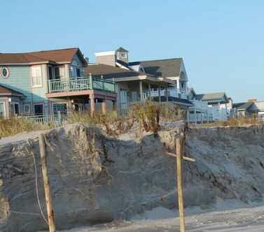 On natural dunes, as sand is lost on the seaward side, it is typically deposited on the crest and landward side of the dune (Psuty and Ofiara 2002) during
