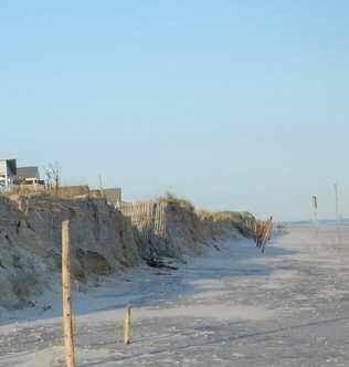 Along developed coastlines, however, there is typically limited space for the dunes to shift inland, which exposes the dunes to increased wave attack and