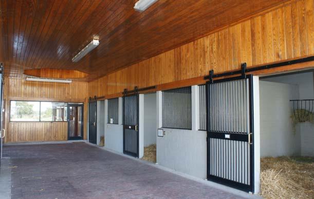 Office/Auxiliary Stallion Barn The third building in this courtyard complex contains a 1,500 square foot office with vestibule, reception area, three offices, kitchen, copy room, and his and her