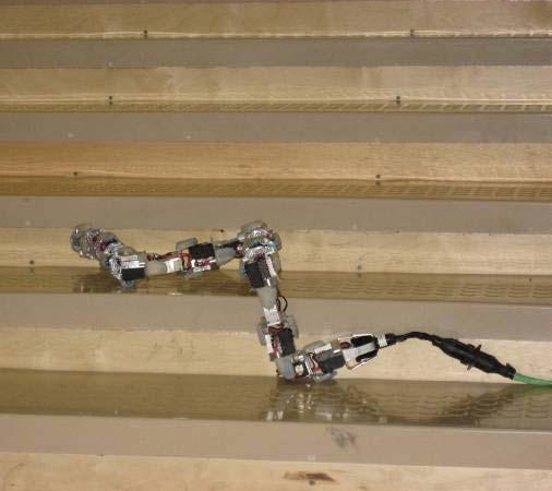 Additionally, the piecewise differentiable gait may fail to successfully climb a stair if the robot is not properly aligned to the stair when the gait is initiated, either due to being angled or