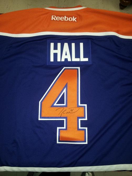 Item #9 Taylor Hall Signed Jersey Taylor Hall signed