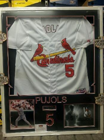Item #6 Albert Pujols Framed Jersey Framed Albert Pujols Jersey from when he played with the St. Louis Cardinals.