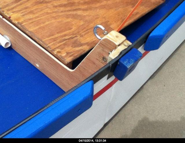 A horizontal 1x1, 2 inches long was glued and screwed to the cutout at the top of the bulkhead, as shown below.