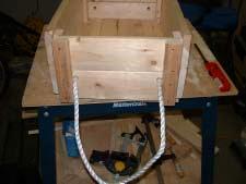 Would you like the rope handle to be long enough to hand out just at the side or would you like the rope handles to extend over the top of the crate when it is being