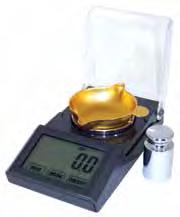 It comes with a removable powder trickler that can be mounted on the scale in a right or left-hand position.
