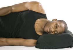 in bed. Avoid holding your shoulders in an awkward position and carrying heavy objects on the painful side.