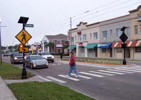 RRFBs are solar-powered, user-actuated (similar to existing pedestrian crossing signals) amber LED lights which are used as a supplement to approved pedestrian and school crossing signs.