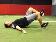 Contract the abdominals and then drive through the heels lifting the body off the floor into a table top position. Hold for 1 second at the top and then slowly lower back down.