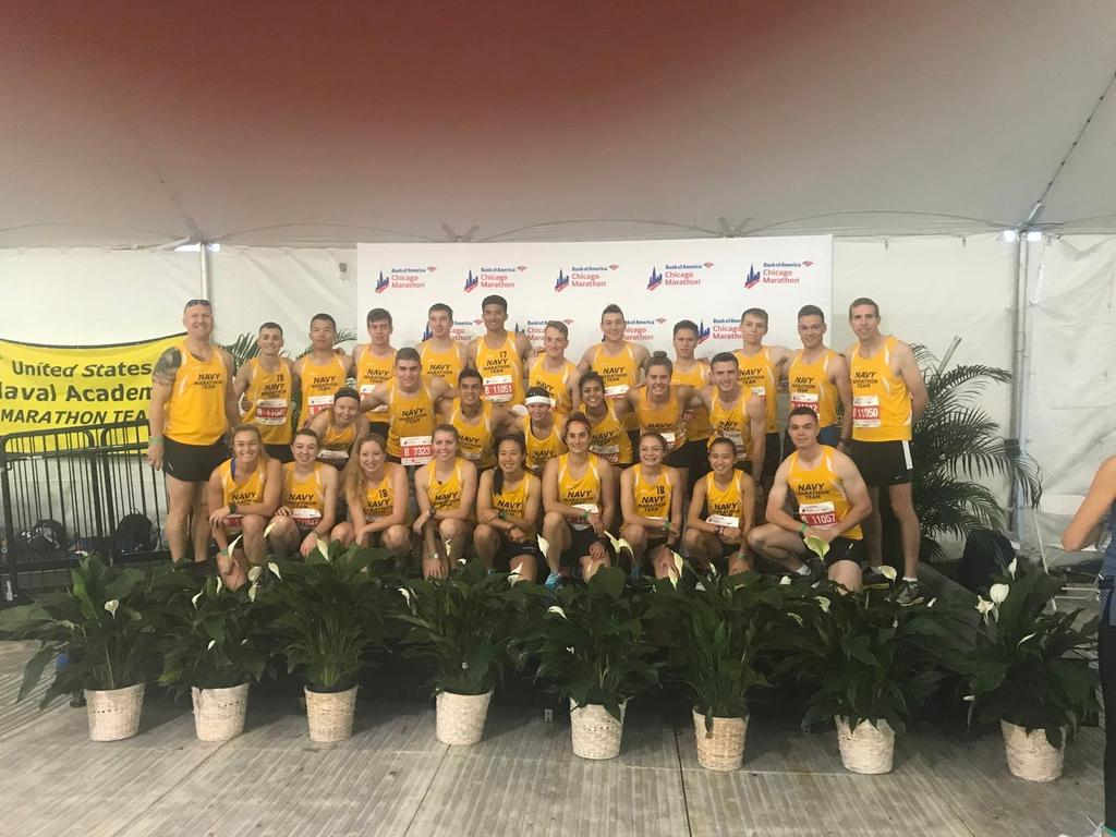 All the members of the USNA Marathon Team assemble for a pre-race picture At the call of various announcements, the team processed to the starting corrals along Chicago s bustling streets.