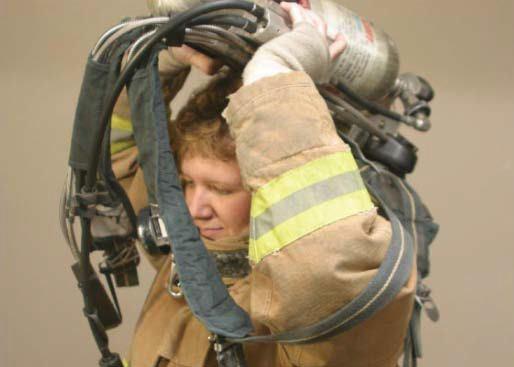 Lift SCBA over your head Slide SCBA down your