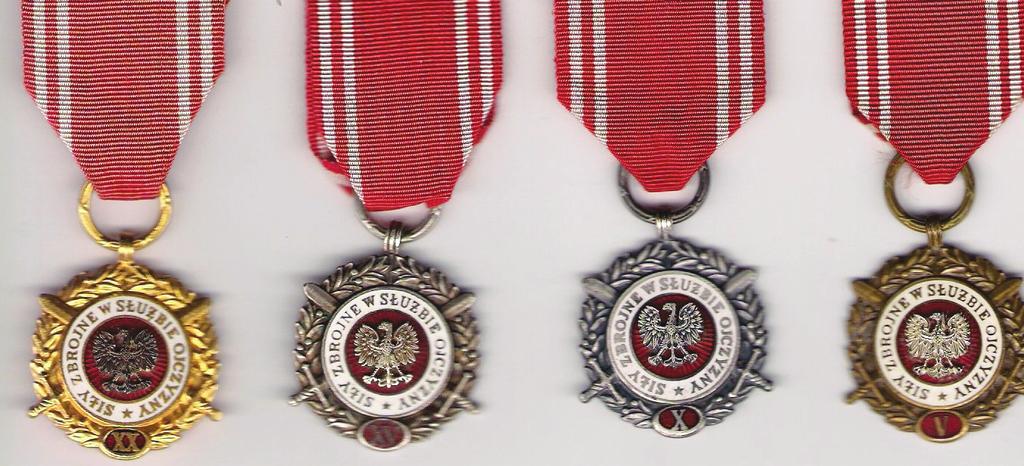 Figure 7: Different types of the Armed Forces in Service for the Country Medal (left to right): gold for XX years (1968), silver for XV years (1960), silver for X years (1951/68), and bronze for V