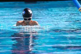 Breaststroke Kick: Simultaneous vertical and horizontal movements of the legs; feet