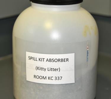 Safety Equipment-Spill Kits To contain chemical spills, we use kitty litter as an absorbent.