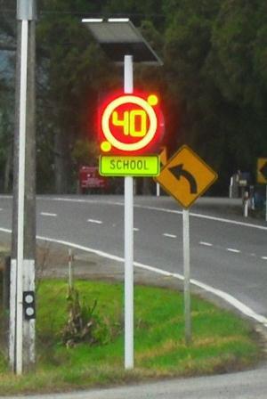 Variable Speed Limit Signs Sign with flashing lights illuminates during morning and afternoon school times to enforce a temporary reduced speed limit.