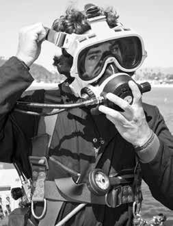 2.25 Donning the EXO Mask 1) Make sure that all other gear is properly donned, the air is on, and regulator functions and communications tests have been done.