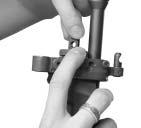 Handling 5. Install the gas valve: With the notch for the retention stud facing downwards in the flange of the gas tube. Press in the catch and turn the gas valve to the right up to positon I.