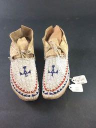 LOT 424: EARLY BEADED CHILDS