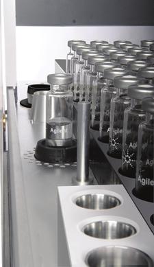 The sample probe lifter raises and lowers the current vial into the single- vial oven, and to and from the sampling probe. In the 111 vial model, the tray resides on top of the unit.
