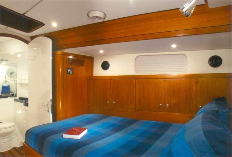The pilothouse is fully watertight, with a sealed door to the cockpit so that it may be heated or air conditioned and kept dry in heavy weather.