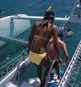 Day Charter - TAÏTI 80 Taïti 80 The Taïti 80 is a sports catamaran specifically designed for commercial operators who