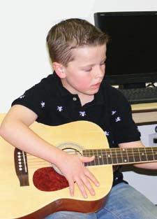 The 8-week course includes proper posture and positioning, age-appropriate and kid friendly music theory and fret-board harmony, notation (how to read music), beginning and advanced chords, ear