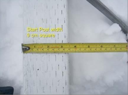 The posts must be placed at the front edge of the start ramp.