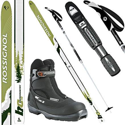 12 Typical XC heavy touring setup nordic style grip with adjustable strap wider, shorter ski with metal edges and some side cut.