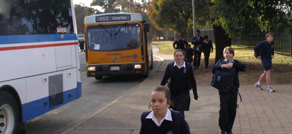 Photo 21: Children on their way to Trinity Christian School, Wanniassa, by bus.