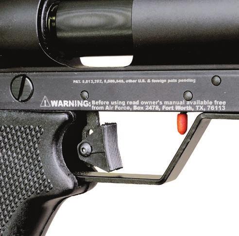 The current AirForce trigger is a two-stage nonadjustable unit with an automatic safety. The redtipped wire in front of the trigger is the safety.