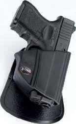 Trigger Retention Active retention which holds the weapon on the trigger guard until released with the holder s thumb.