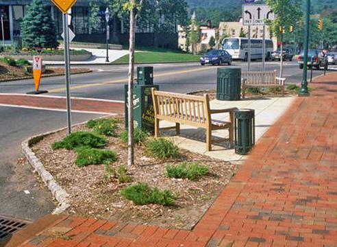 MID-BLOCK CONSIDERATIONS Include bollards, landscaping, or other buffers between pedestrians & vehicles Buffer treatment height, width, & design must