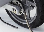 Position your KM500R over your chain on the bottom side of your swingarm; cut the pin on the right side of the link you choose first.