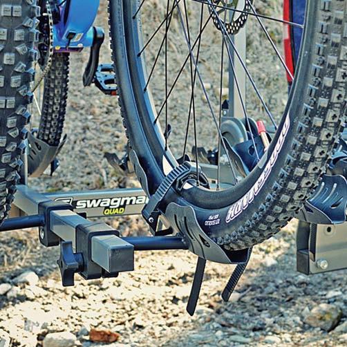 Think of this rack as your trusty Sherpa, safely traversing the wilderness to get your bikes to