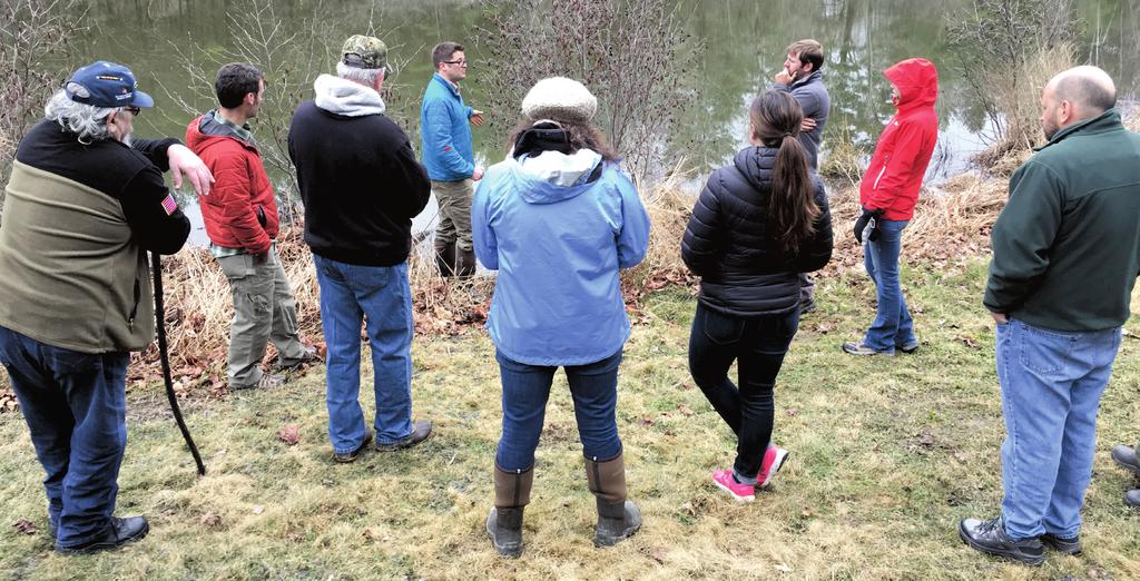 PHOTOS BY SAMARA TRUSSO, PENNSYLVANIA GAME COMMISSION Wildlife Biologist Cory Mosby, of the Maine Department of Inland Fish and Wildlife, familiarizes workshop participants