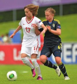 UEFA WOMEN S UNDER-17 Left: Ewa Pajor on the ball during Poland s final victory Below: Spain s Marta Turmo puts in a challenge against Belgium lunch. Then we have some free time and we rest.