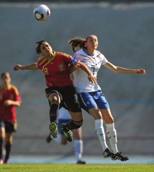 Left: Germany celebrate a goal scored against Norway Right: Maren Knudsen of Norway Below: Spain s Ana Buceta challenges Nadia Coolen of the Netherlands The format was changed to WU19 in 2001/02, but