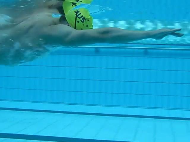 fingertips to the bottom of the pool.