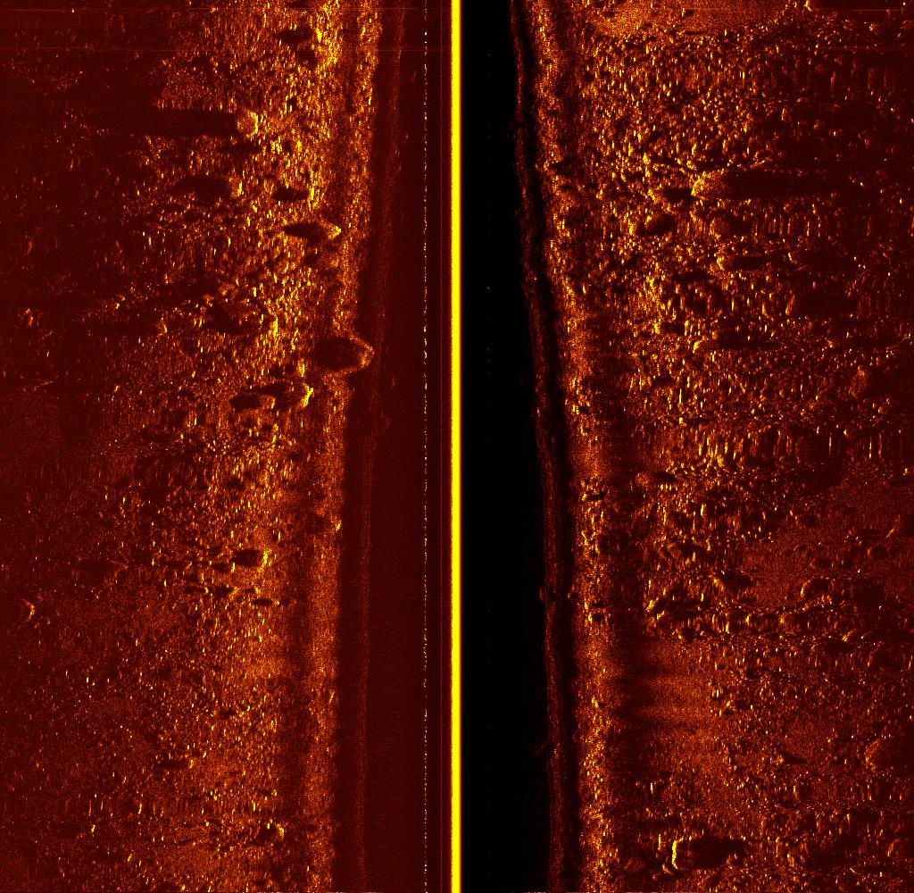 Figure 4. Side scan sonar data obtained with the SeaBED AUV. The site is off of Woods Hole, MA and was used as a bombing range towards the end of the Second World War.