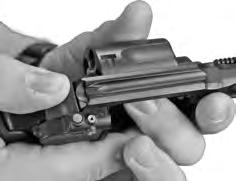 UNLOADING WARNING: ALWAYS KEEP YOUR REVOLVER POINT- ED IN A SAFE DIRECTION.