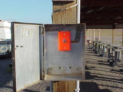 Flag pole & range safety system: The flag pole is located in the center of the 100/200 yard area. The flag is stored in the metal box just Northwest of the pole.