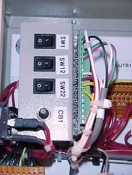The switch panel also has a Circuit Breaker that interrupts power to the cooling tower fans, valves and evaporator and condenser pumps, if any of these are tied into the MicroTech II controller for