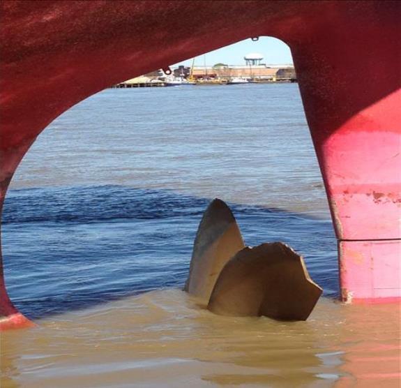 At left, Nordbay s damaged propeller (photo by DNV-GL). At right, the destroyed River Transport Services dock (photo by Infinity Engineering Consultants).