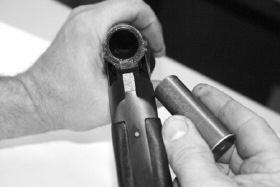 Barrels marked with 2 3 / 4 (70mm) will use only 2 3 / 4 (70mm) and must not be used with or 3 (76mm) or 3 1 / 2 (89mm) shells. 2. Visually inspect the chamber and barrel for obstructions by breaking open the shotgun by depressing the locking lever and tipping the barrel down.
