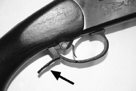 After inspection, load the correct type of shot shell into the chamber making sure that the shells are flush with the extractor (See Pictures 24 and 25), then close the action by swinging the barrel