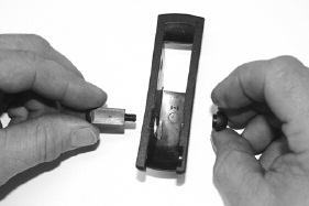 counter-clockwise (See Pictures 2 and 3). Remove the Trigger Lock Screw. Picture 2 Picture 3 2.
